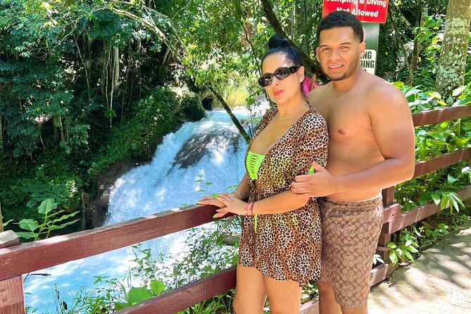 Blue Hole Waterfalls and Bamboo Rafting with Transportation - Blue Hole Falls: Rope Swings, Mineral Pools, and Lifeguard-Supported Fun