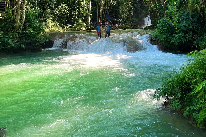 Blue Hole Waterfalls and Bamboo Rafting with Transportation - Lunch Break: Getting Fed Without Wasting Your Day
