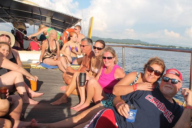 Catamaran Cruise Full Day Tour to Reef, Caves and Negril Beach - Snorkeling from the boat: calm water, coral, and timing