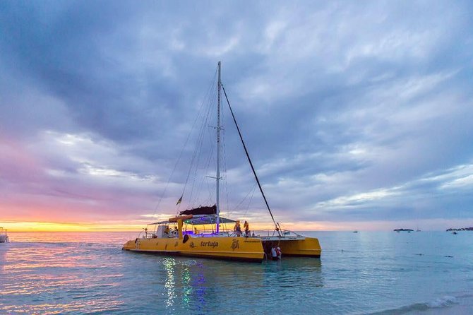 Catamaran Cruise Full Day Tour to Reef, Caves and Negril Beach - Adults-only vs family-friendly days, plus motion and getting wet