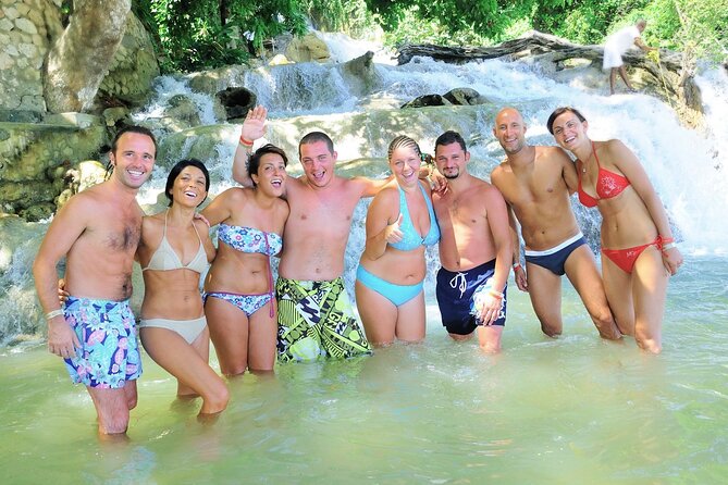 Dunn's River Falls and Ocho Rios Shopping Tour from Runaway Bay - Main Street shopping: craft market energy with the same-same risk