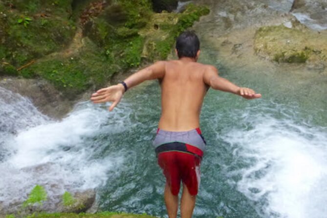 Dunn's River Falls, Blue Hole, Bamboo Rafting, Horseback Combo - Entering Dunn’s River Falls: The Famous 600-Foot Waterfall Experience