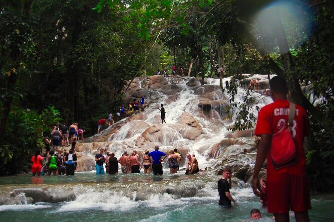 Dunn's River Falls Party Cruise, Blue Hole with Snorkeling, free beverages - Dunn’s River Falls climb: iconic, slippery, and worth the work