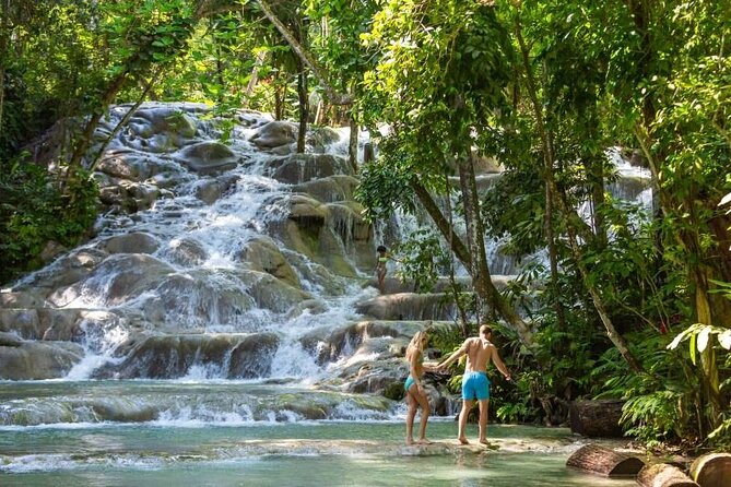Dunns River Falls, Zipline, Bamboo Rafting, Horseback Ride Tour - Horseback ride and swim: from countryside roads to warm Caribbean water