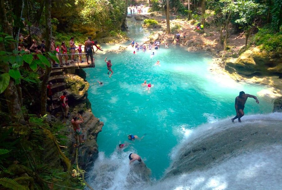 From Ocho Rios: Blue Hole Tour with Jamaican KFC Meal - The guide makes it feel personal: Norman’s kind of energy