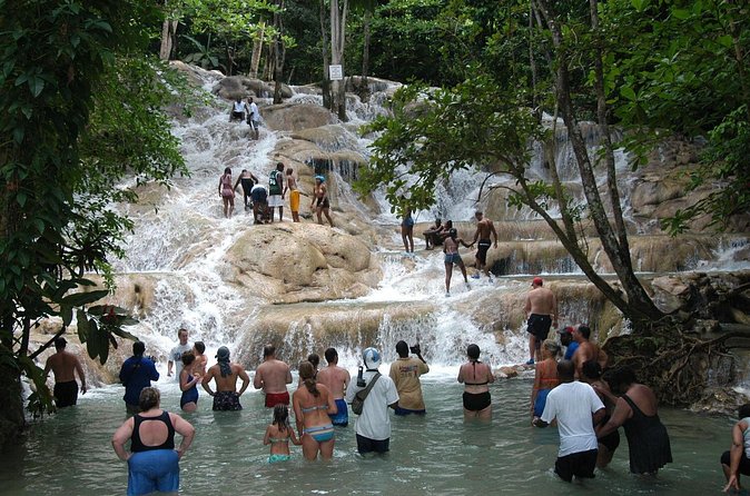 Jamaica Dunn's River Falls Party Cruise with Snorkeling - The Boat Ride Between Stops: Views, Music, and Scenic Passing