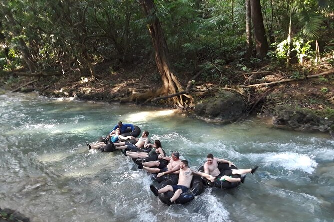 Private Tour From Ocho Rios To Dunn's River Falls Tubing and Shopping - First stop: Dunn’s River Falls arm band, water shoes, and the climb