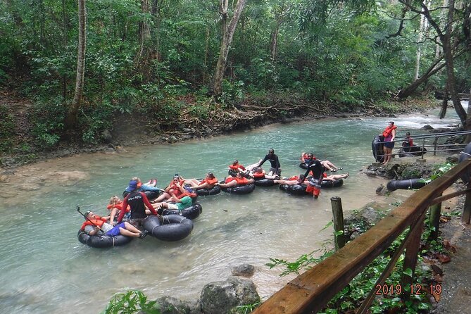 Private Tour From Ocho Rios To Dunn's River Falls Tubing and Shopping - White River rafting/tubing: optional fun with a real cost