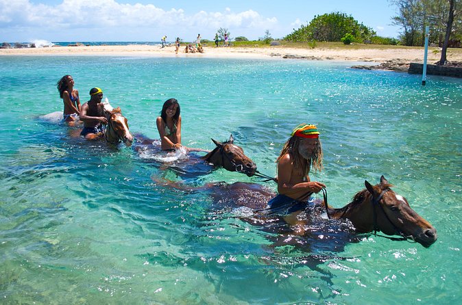 Sand n Saddle Horseback Ride & Swim Tour from Runaway Bay - Lunch and Red Stripe at the local jerk center (what to budget)